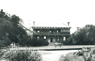 An early photo of Brush Farm House